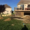 Rabolt Wood Deck with Black Balusters and Solar Caps