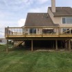 Rabolt Wood Deck with Black Balusters and Solar Caps